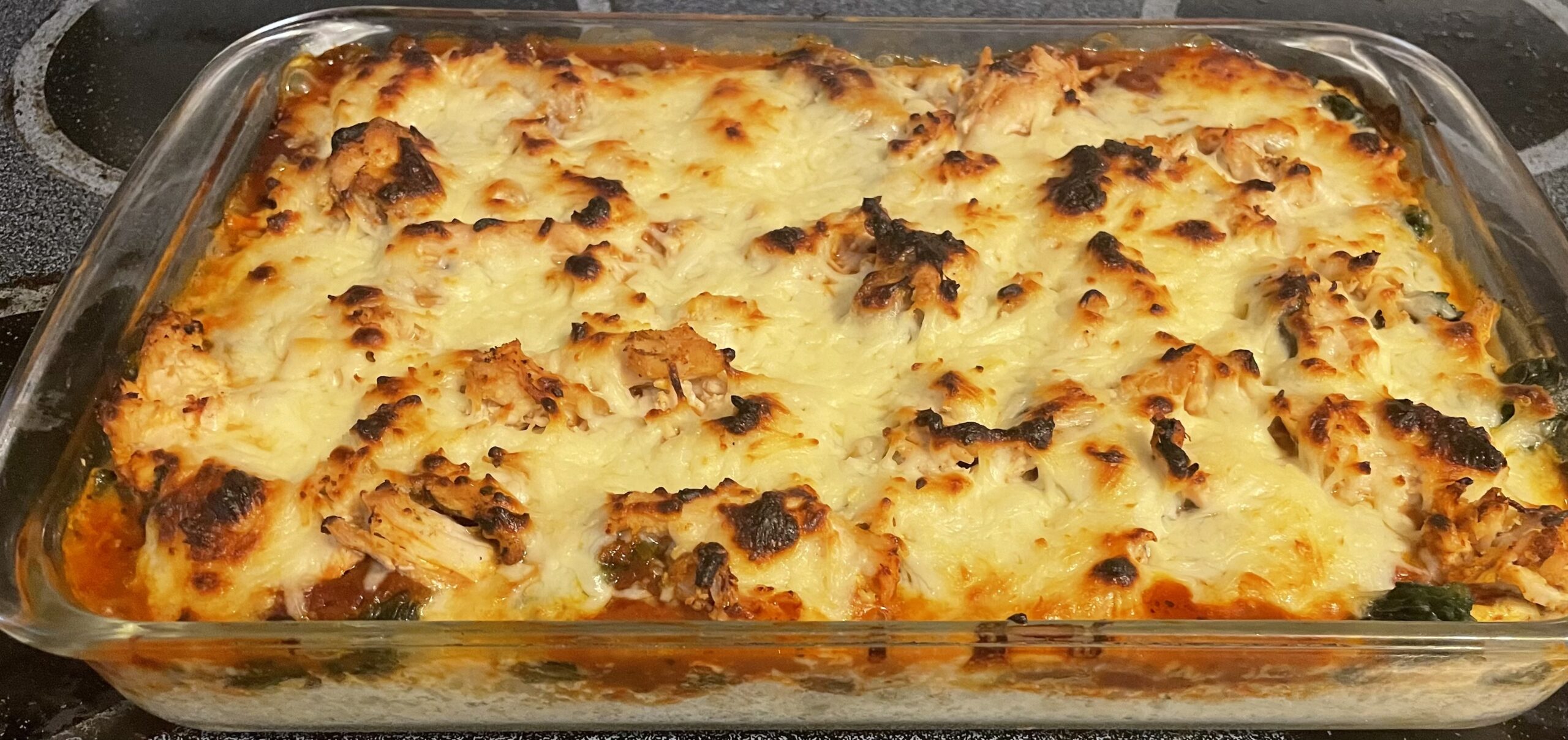 Chicken and Spinach ricotta bake in oven safe pan.